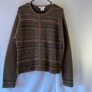 The size on the tag says extra large, but it looks to me as if it's a large